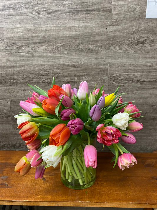 Rainbow tulip arrangement